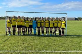 Stewkley FC U1 girls' team proudly show off their new kit sponsored by Leighton Buzzard business AB Vehicle Repairs