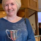Oonagh Russell with the Barney Hallam Trophy.