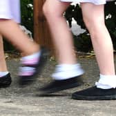 File photo of school girls walking to school.