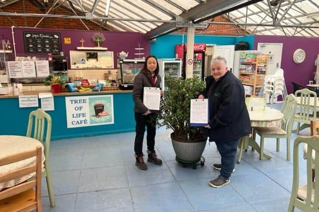 Iris (left) and Bev with the new petition. Image: Leighton Buzzard Garden Centre.