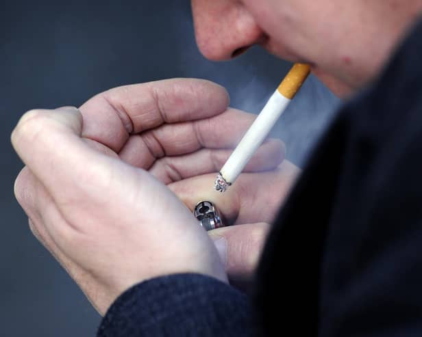 PICTURE POSED BY A MODEL File photo dated 12/03/13 of a man smoking a cigarette.