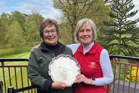 Gill (left) receives the Grannies Salver from Ladies Captain Barbara Rickard, who was runner-up.
