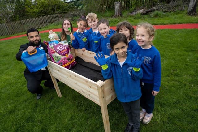 Redrow South Midlands has donated gardening gloves, soil, vegetable seeds, and a garden trug to Leedon Lower School