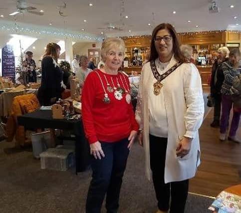 Ladies captain Oonagh Russell with Town Mayor Farzana Kharawala.