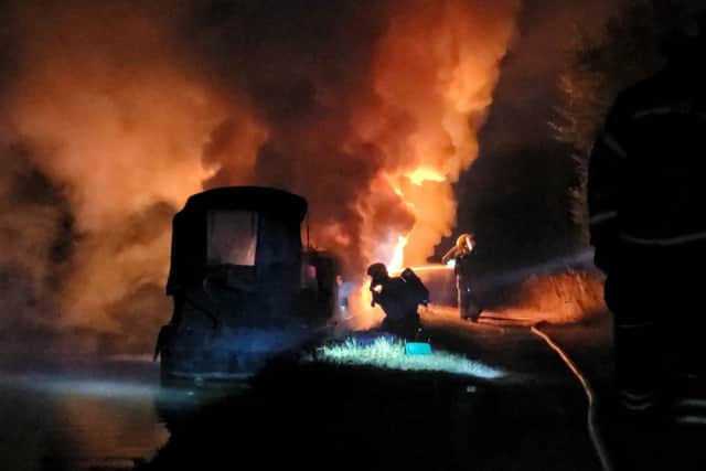 The boat engulfed in flames. Image: Bedfordshire Fire and Rescue Service.