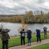 Members of the North Bucks branch of the RSPB take part in a birdwatching activity at Caldecotte near Milton Keynes