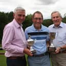 Senior Section skipper Andy Mcdonald (centre) with Ian Mann trophy winner Graham Freer (left) and John Tarbox, (right), the Peter Myrants Trophy champion for the lowest nett score.