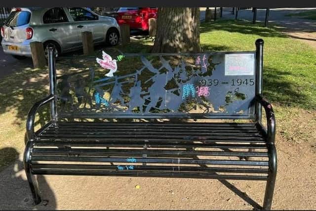 Graffiti on Wally Randall's memorial bench. Image: Laura Hunt.