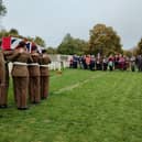 The coffin of Pte McIntosh is carried to the graveside as his family looks on (Crown Copyright)