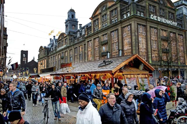 Enjoy Dutch pancakes and a hot toddy while strolling around Amsterdam's cobbled street