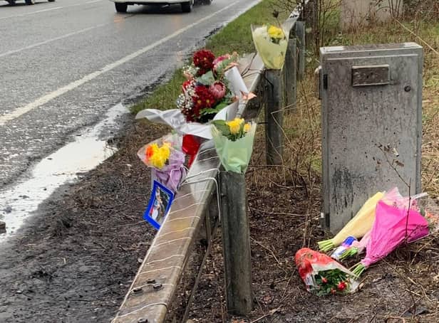Flowers left at the scene of the fatal A505 bypass crash which claimed the life of Brandan Moriarty in March 2022