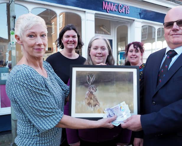 Artist Suzanne Southerton, prize winner Emma Davies, and RBL member Stuart Clarke.  Back - Kay Fisher and Sarah Prudomes from Mimic Gifts. Image: Tony Margiocchi