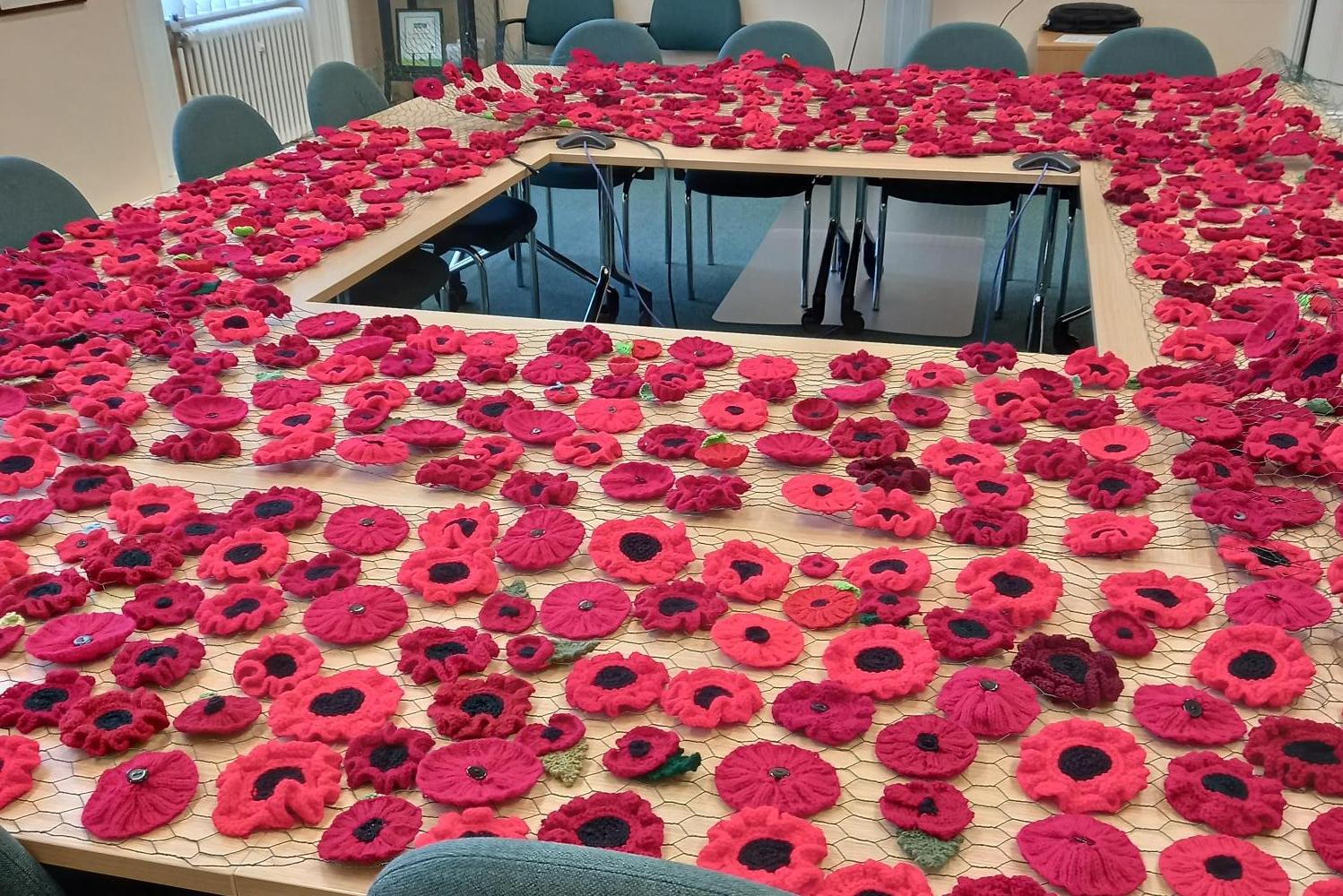 Volunteers busy creating beautiful poppy displays for Leighton-Linslade Remembrance