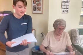 Damien, engaging wholeheartedly in care home community life, enjoys a lively chat with residents while kindly offering crosswords and word searches to keep their minds active and spirits high.