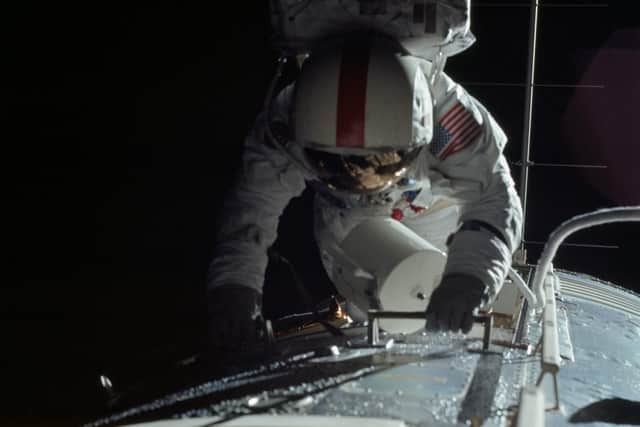 Astronaut Ronald E Evans Retrieving Film From Cameras - Apollo17 Mission
