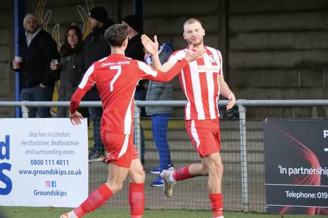Albie Hall is congratulated after scoring at Hertford. Photo: Andrew Parker.