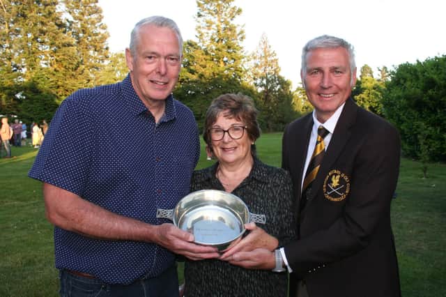 Captain’s Day trophy winner Mark Vincent with Gill Mcdougall and club skipper Graham Freer.