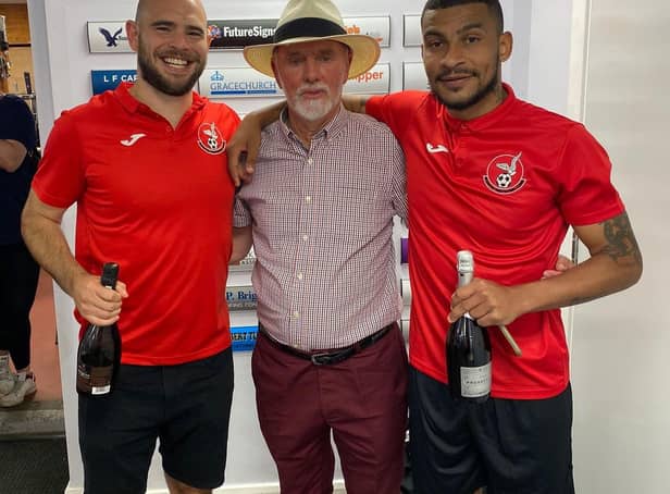 Joint men-of-the-match Lewis Toomey (left) and Leon Lobjoit (right) are pictured with match sponsor Bob Blake. Photo: Leighton Town FC.