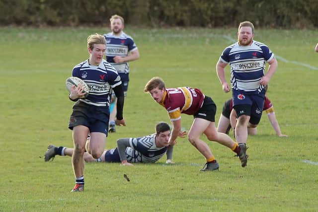 Seventeen-year-old Ben Cullen races away to score on of his four tries. Photo by Steve Draper.