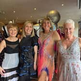 Pictured from left in their glitterball outfits are Annette Kempsell, Laura Smith, Lesley Bednarek and Sue Preston