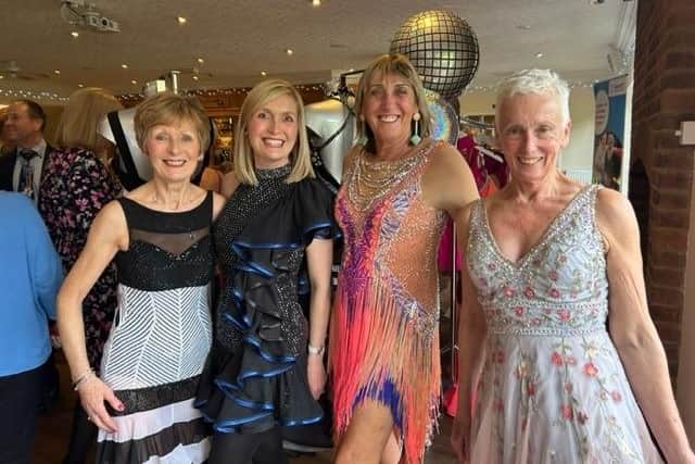 Pictured from left in their glitterball outfits are Annette Kempsell, Laura Smith, Lesley Bednarek and Sue Preston