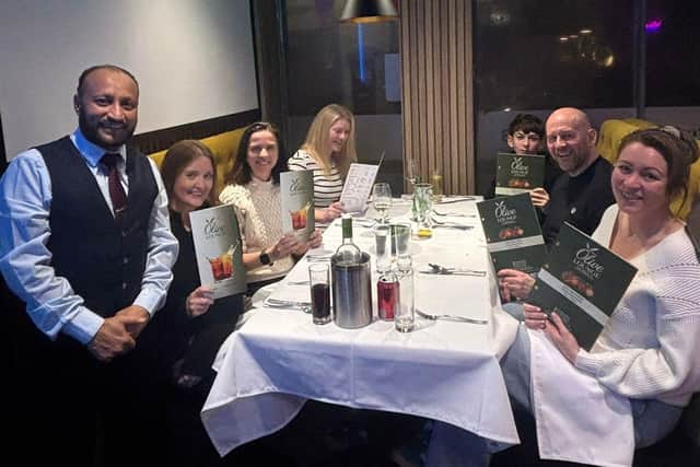 Guests on the opening night with owner Jay