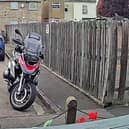 The motorbike pictured on the kitchen camera before it was stolen. Image supplied by Adam Tester.