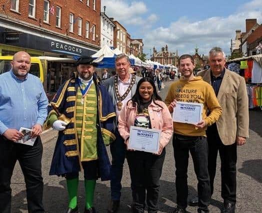 Pictured from left to right: Judge Brendan Dyson (NMTF), Town Crier Chris Morgan, Town Mayor Councillor Pughe, joint winners Roma Shukla and Chad Killoran, Judge David Preston (NABMA)
