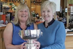 Leighton Ladies Captain Oonagh Russell presents the Rosewear Bowl to winner Angela Samuels.