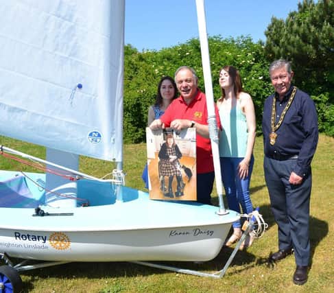 Ian and family with Mayor Kevin Pughe naming the Dinghy