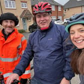 Emma Holland-Lindsay and Cllr Shaun Roberts pictured with cyclist Chris Sevenson