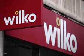 Signage outside a branch of the British high-street retail chain "Wilko"  Photo by JUSTIN TALLIS/AFP via Getty Images)