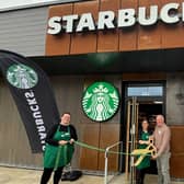 Cutting the ribbon at the new Starbucks. Picture: Starbucks