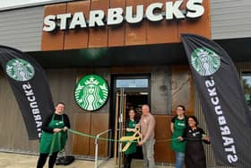 Cutting the ribbon at the new Starbucks. Picture: Starbucks