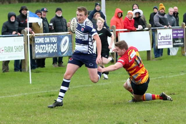 Tom Winch prepares to score a try for Buzzards. Photo by Steve Draper.