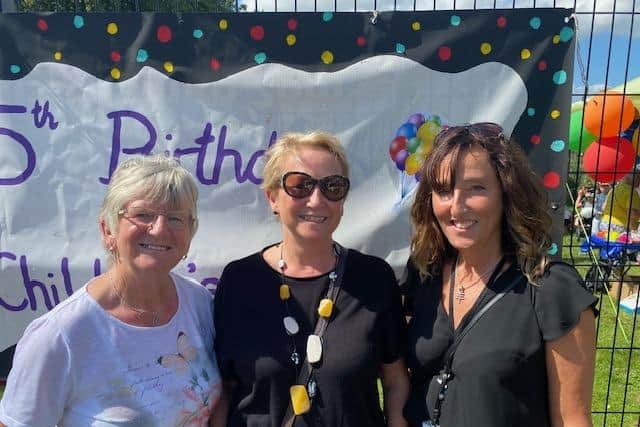 Chris Daniels (in white), the centre's first administrator, Hazel Jeffrey (centre), the centre's first manager with Micheala Pugh, family support worker
