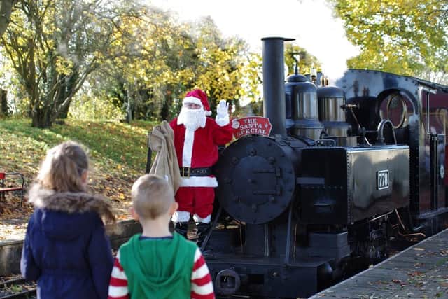 Father Christmas meets excited children. Image: Leighton Buzzard Railway.