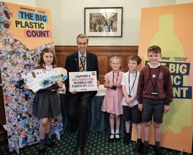 Andrew Selous, Conservative MP for South West Bedfordshire, meets children in the House of Commons. Credit: Greenpeace UK