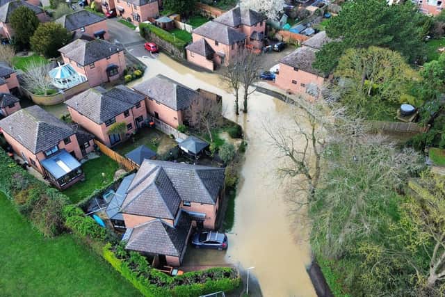 Drone image of flooding around houses in the town. Picture: Lowland Rescue