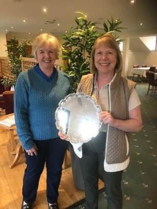 Sylvia Dell receives her trophy from Oonagh Russell
