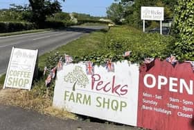 Pecks Farm Shop had to erect their own signs to indicate it was business as usual during the road closures