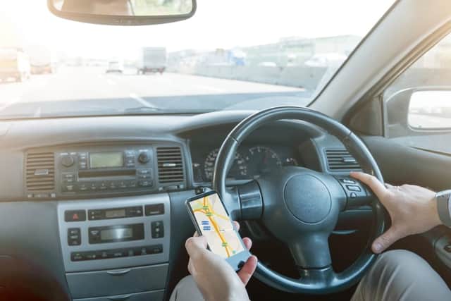 You currently can't use a handheld phone as a navigation device (Photo: Shutterstock)