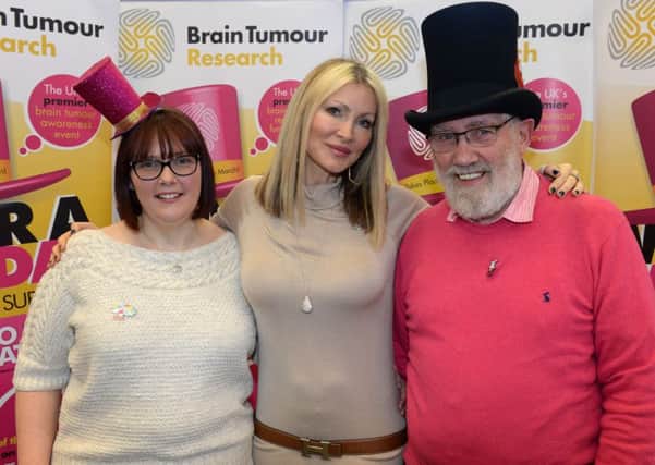 Catrin Ireland, Caprice and Catrin's dad, Keith Evans, at the Brain Tumour Research, Wear a Hat Day launch, 2018, at MK HQ. Photo by Jake McNulty