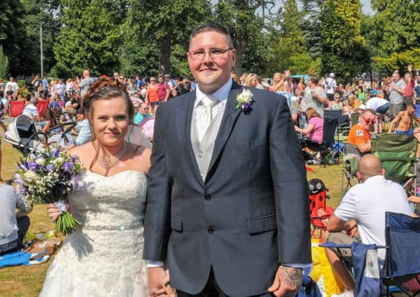 Mr and Mrs Porter got married on Saturday and were cheered by the crowd at Party in the Park in Dunstable. Photo by John Chatterley