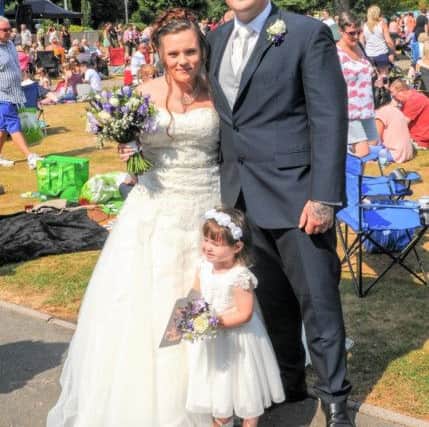 Mr and Mrs Porter got married on Saturday and were cheered by the crowd at Party in the Park in Dunstable. Photo by John Chatterley