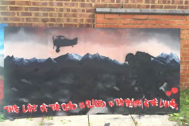 The 1918 mural. (In the style of artist, Banksy).