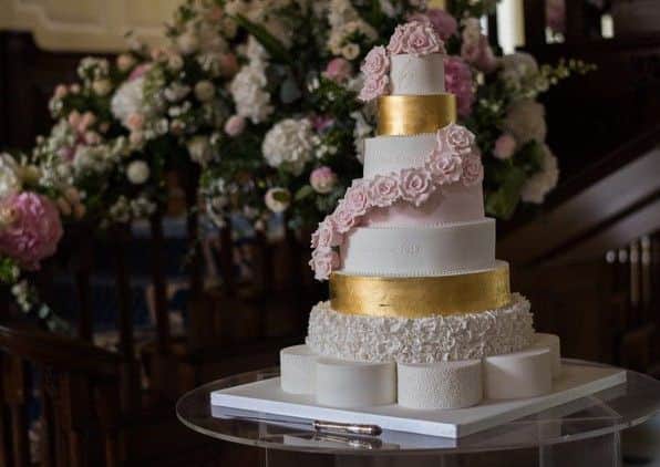 The owner of La Belle Cake Company made  this cake for the first Love Island wedding. Photo by Dreem Studios (www.dreemstudios.com.)