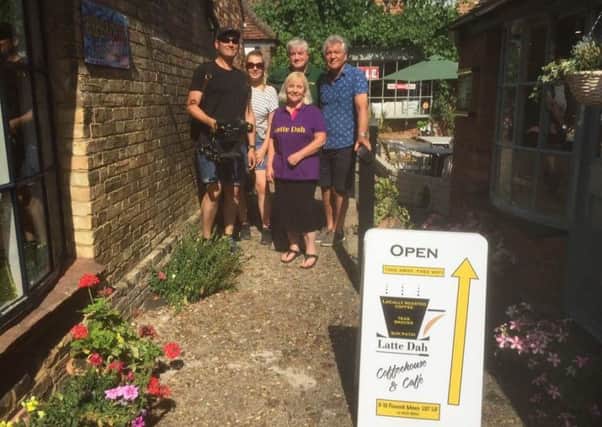 Peter with the crew from the BBC and Gina and Clive, owners of Latte Dah cafe, where one of his items was bought