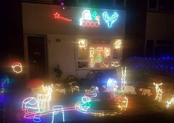 Amanda and Rob's Christmas lights display thanks to kind donations.  Credit: Sophie Stone.