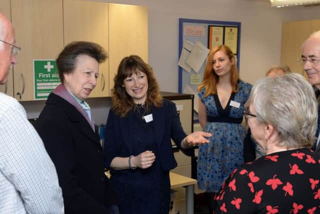 Princess Royal with volunteers and staff